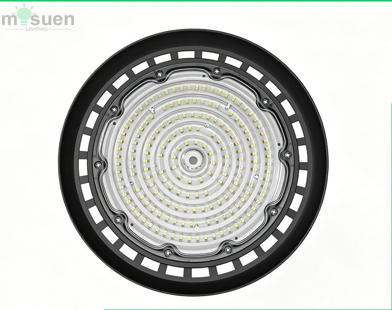 Comparison chart showing switchable 3-power UFO high bay 190lm/W efficiency versus traditional metal halide fixtures and older generation LED high bay lights demonstrating energy savings and luminous output